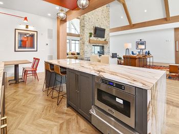 Bar, kitchen, and dining area